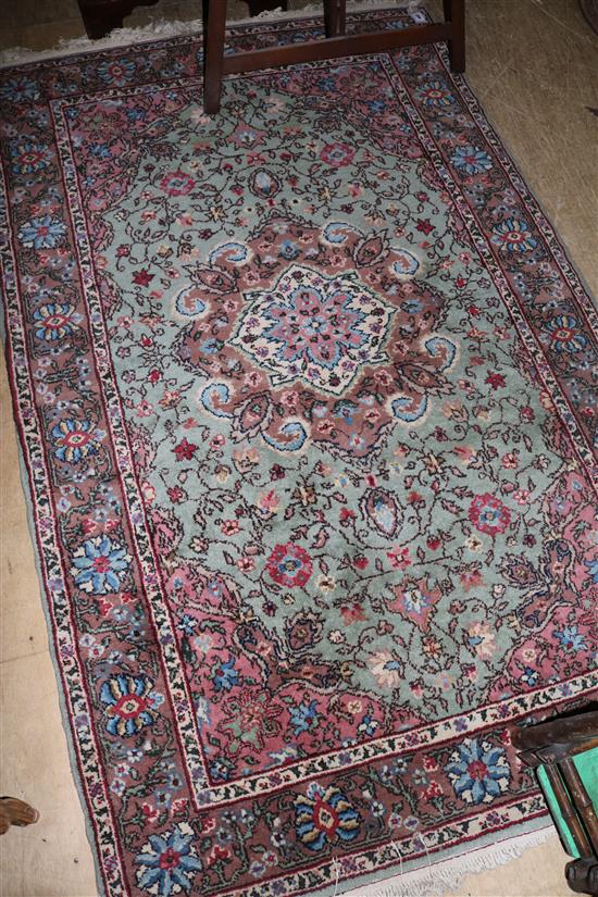 Red & green ground rug